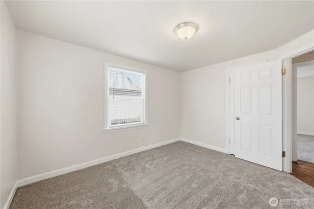 a view of a room that has a window in it