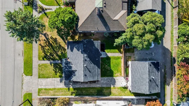 an aerial view of house with swimming pool