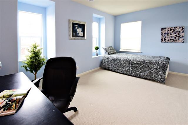 1175 Arrowfield Way San Ramon, CA 94582 - Photo 15 of 27 a bedroom with a bed and a chair with potted plants