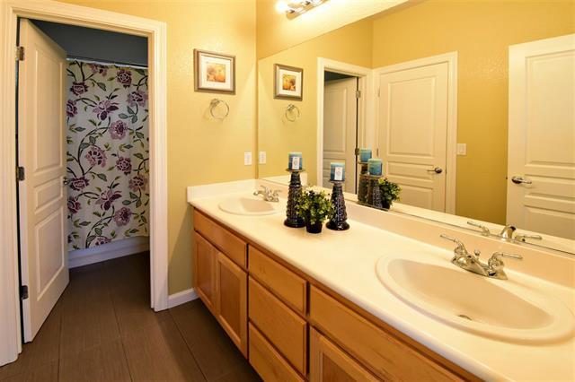 1175 Arrowfield Way San Ramon, CA 94582 - Photo 19 of 27 a bathroom with a double vanity sink and a mirror