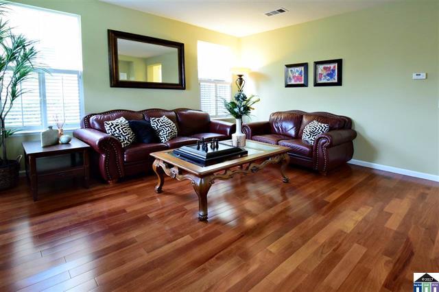1175 Arrowfield Way San Ramon, CA 94582 - Photo 4 of 27 a living room with furniture and a wooden floor