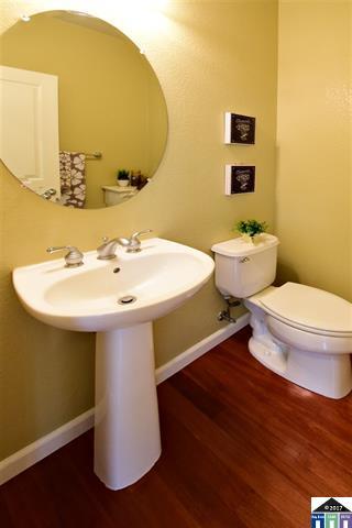 1175 Arrowfield Way San Ramon, CA 94582 - Photo 5 of 27 a bathroom with a sink and a mirror