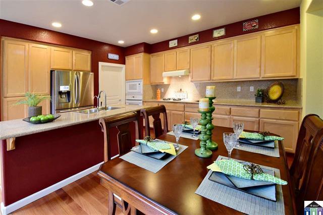 1175 Arrowfield Way San Ramon, CA 94582 - Photo 7 of 27 a room with furniture wooden floor and a window