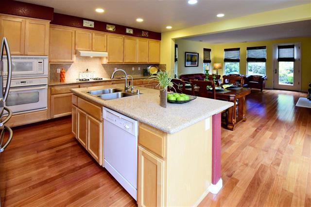 1175 Arrowfield Way San Ramon, CA 94582 - Photo 8 of 27 a kitchen with wooden floors and appliances