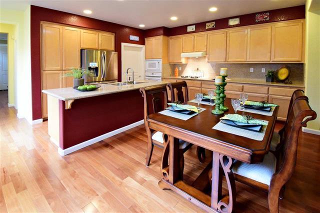 1175 Arrowfield Way San Ramon, CA 94582 - Photo 9 of 27 a kitchen with a large window appliances and cabinets