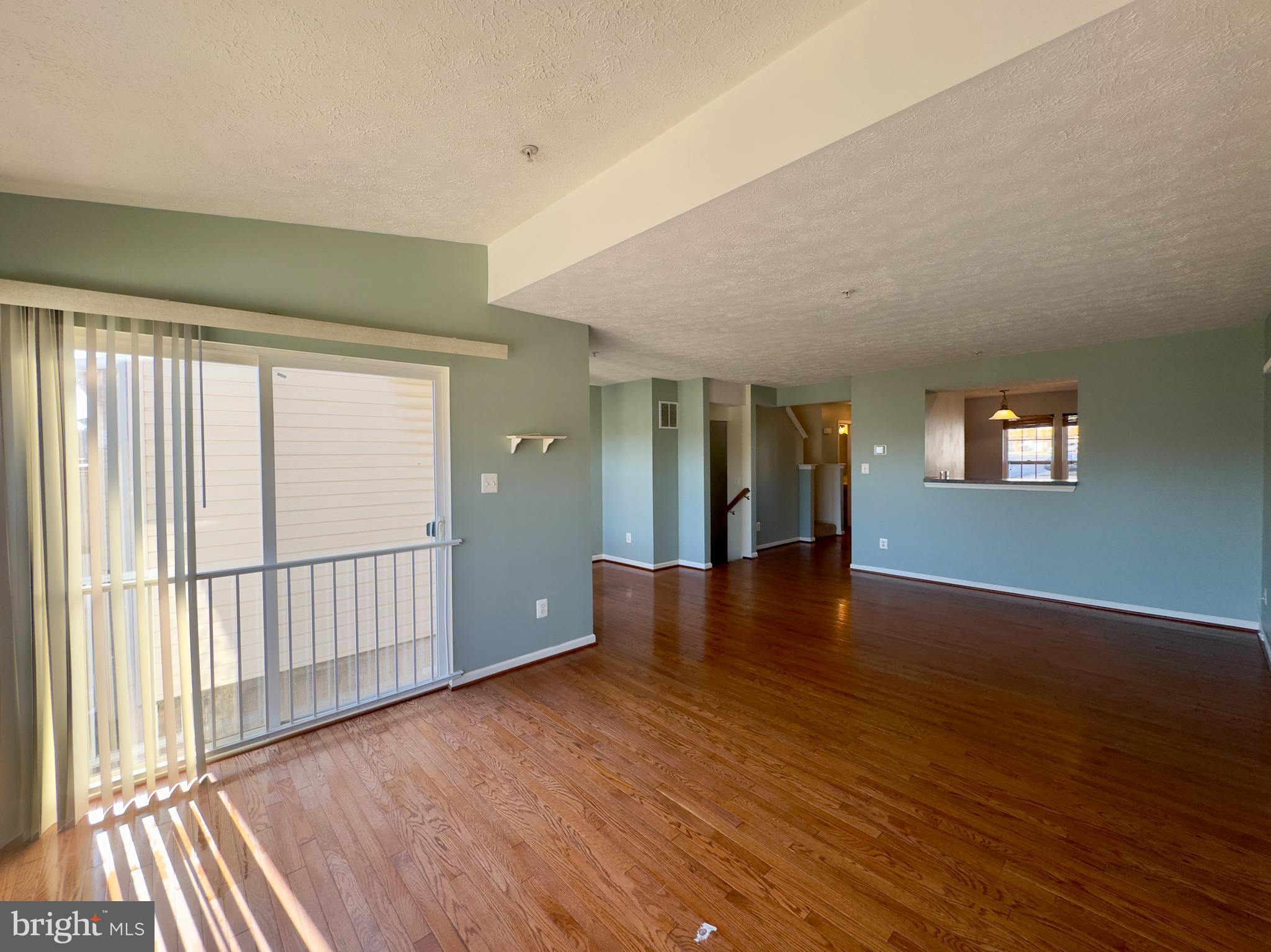 657 Possum Trot Way Aberdeen, MD 21001 - Photo 2 of 25 wooden floor in an empty room with a window