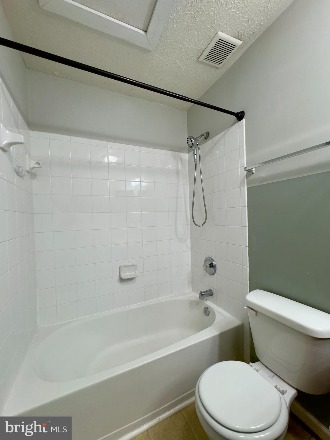 657 Possum Trot Way Aberdeen, MD 21001 - Photo 6 of 25 a bathroom with a toilet and a shower