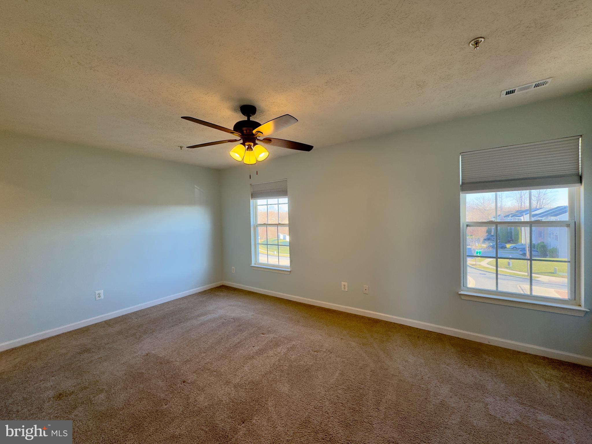 657 Possum Trot Way Aberdeen, MD 21001 - Photo 7 of 25 an empty room with a window