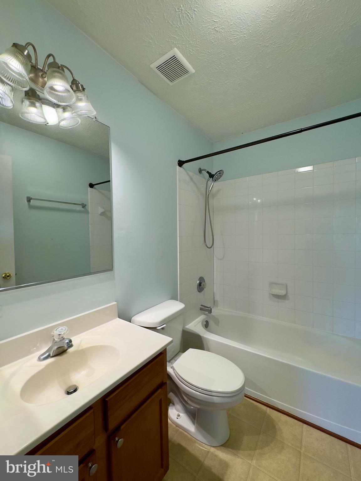 657 Possum Trot Way Aberdeen, MD 21001 - Photo 9 of 25 a bathroom with a sink a toilet and shower