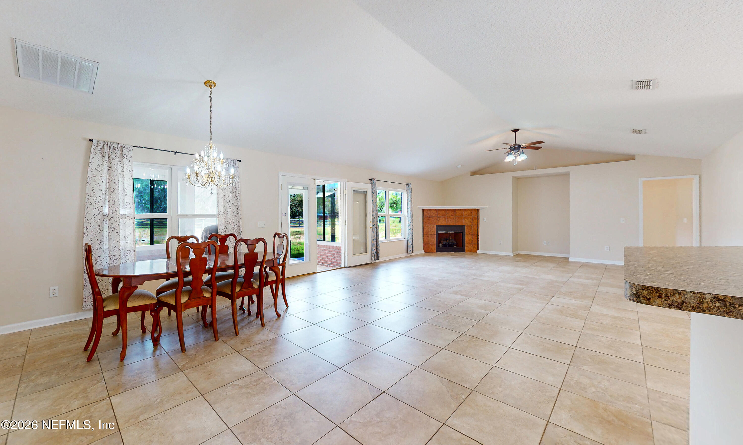 4333 Hawk Haven Road Middleburg, FL 32068 - Photo 17 of 51 a view of a dining room with furniture