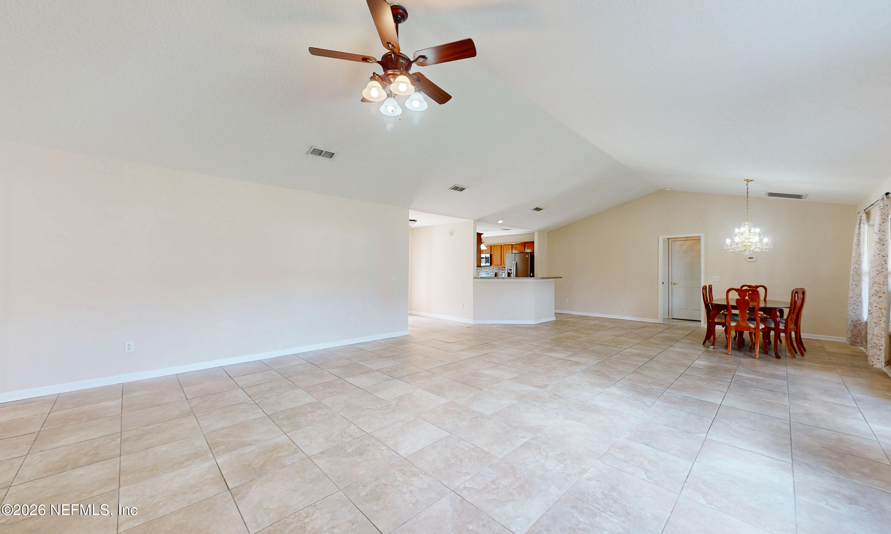4333 Hawk Haven Road Middleburg, FL 32068 - Photo 19 of 51 an empty room with windows and ceiling fan