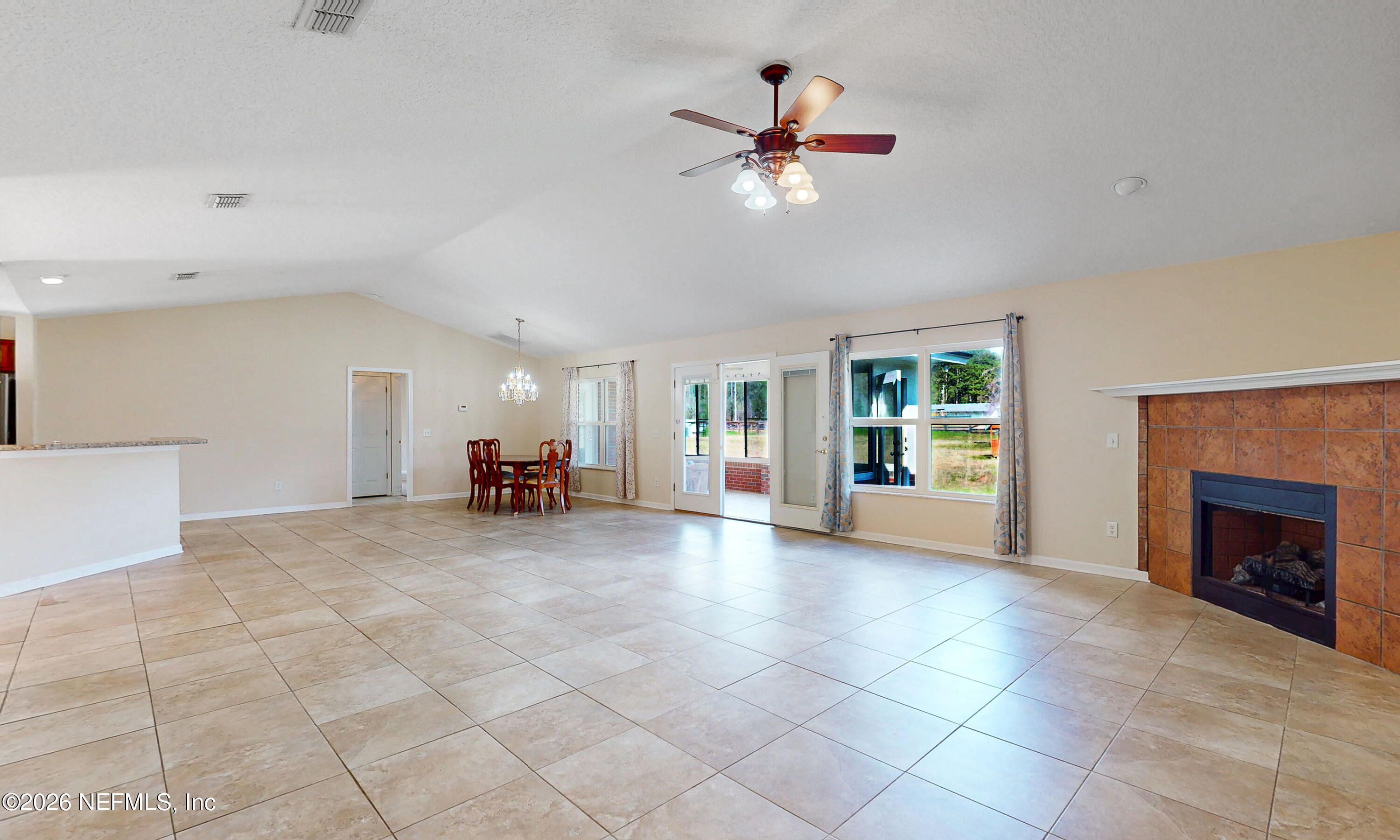 4333 Hawk Haven Road Middleburg, FL 32068 - Photo 20 of 51 a view of a livingroom with furniture and a fireplace