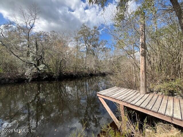 4333 Hawk Haven Road Middleburg, FL 32068 - Photo 27 of 51 a view of a wooden deck and lake view