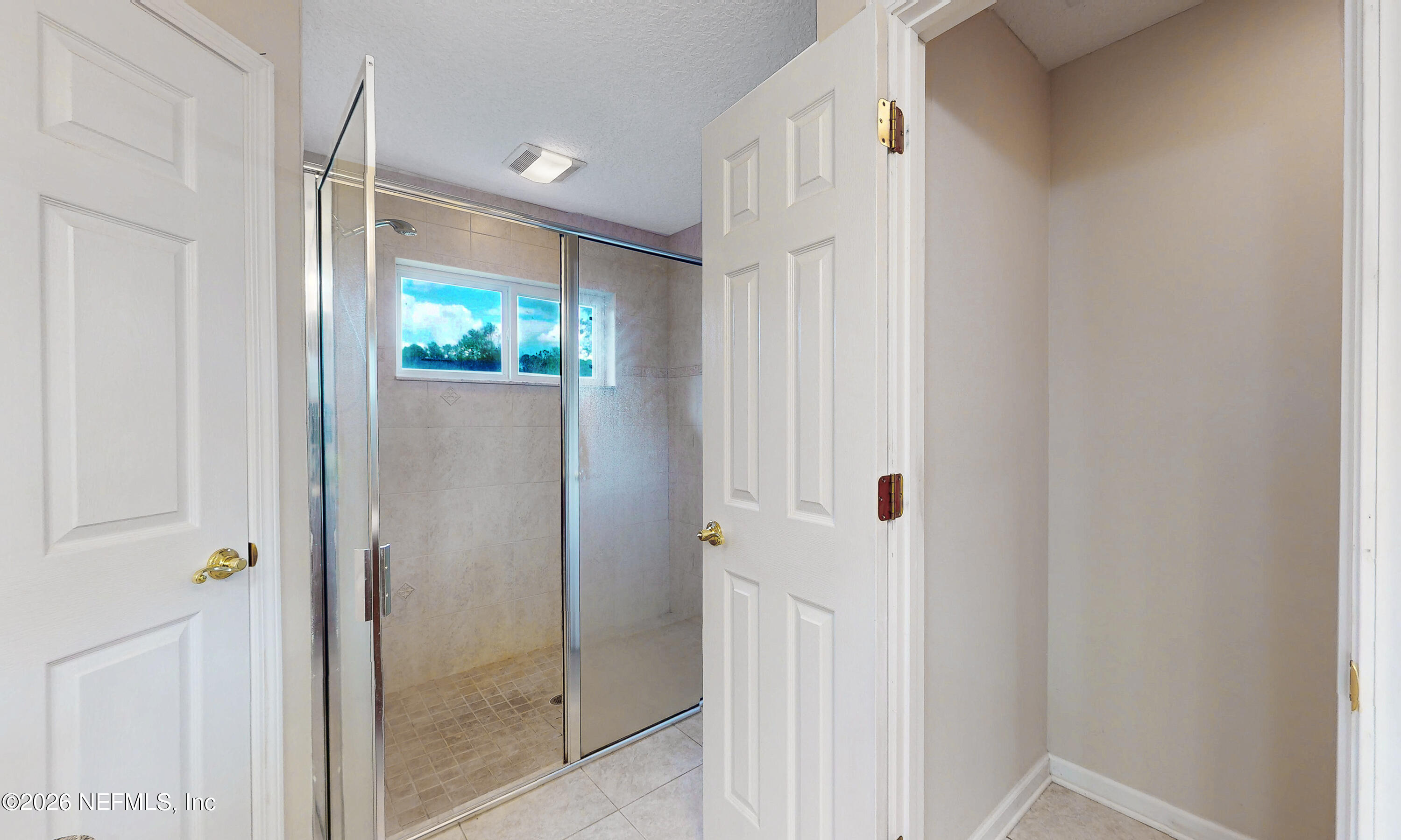 4333 Hawk Haven Road Middleburg, FL 32068 - Photo 37 of 51 a bathroom with a shower