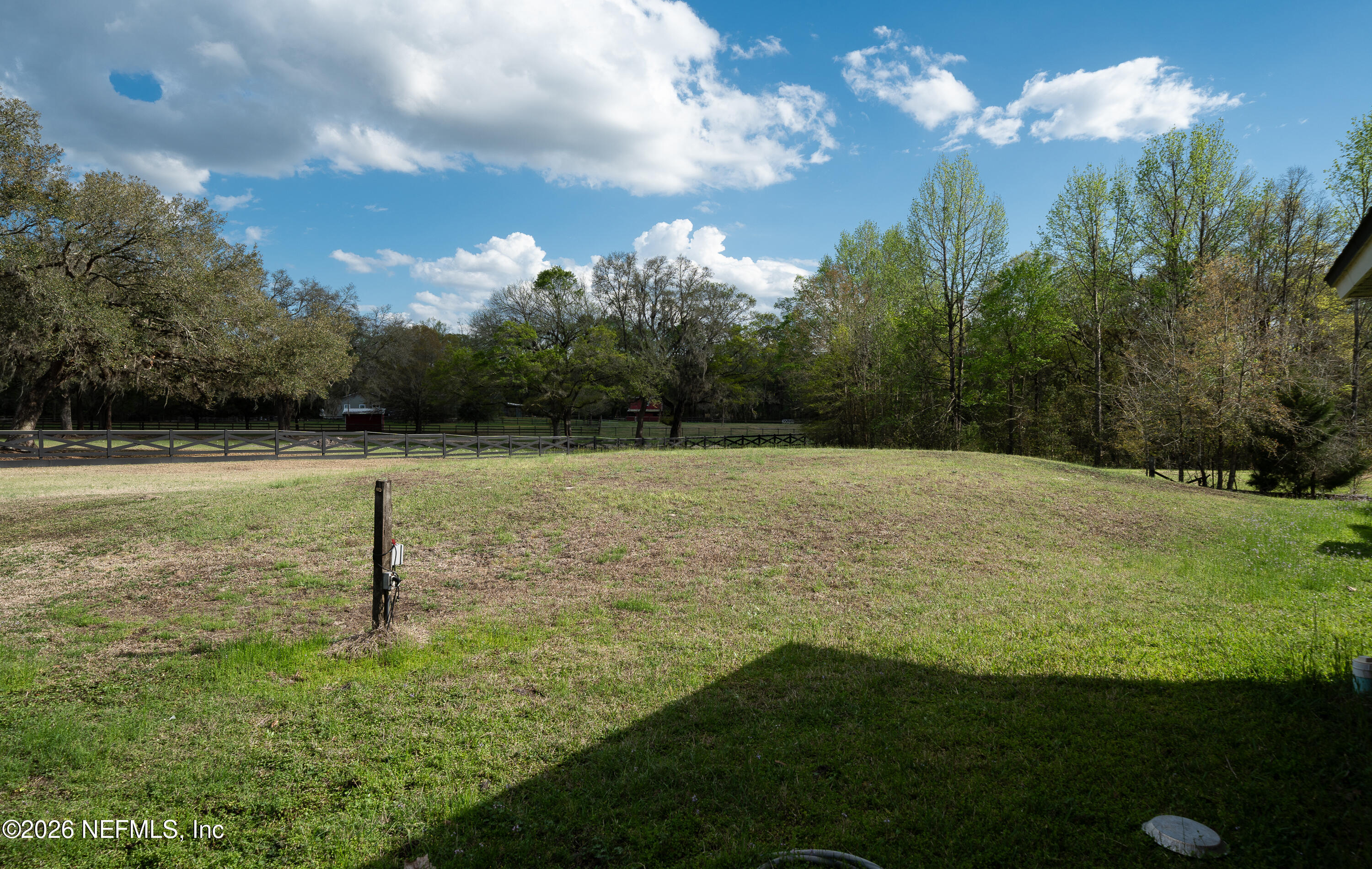 4333 Hawk Haven Road Middleburg, FL 32068 - Photo 43 of 51 a view of a golf course with a lake