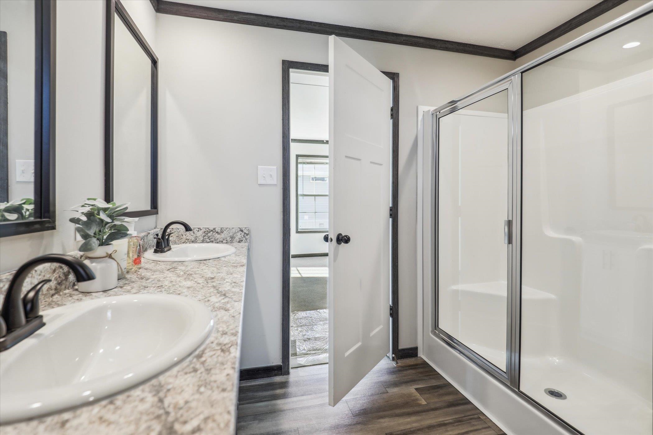 4046 Hinge Gate Lane Memphis, TN 38128 - Photo 15 of 24 a bathroom with a sink and a mirror