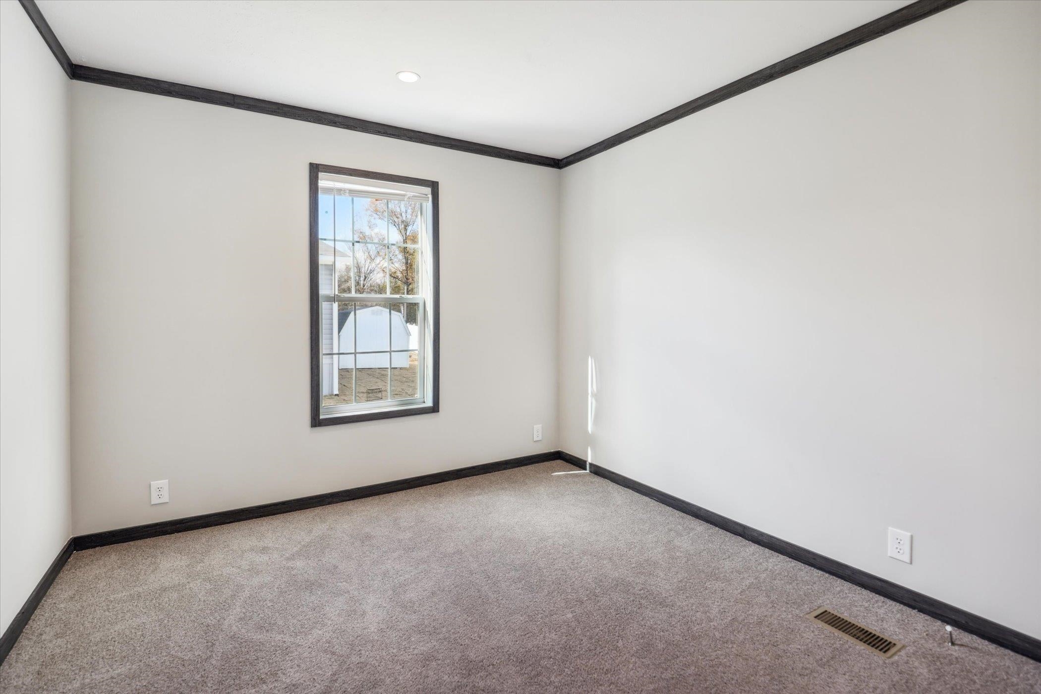 4046 Hinge Gate Lane Memphis, TN 38128 - Photo 21 of 24 a view of an empty room with a window