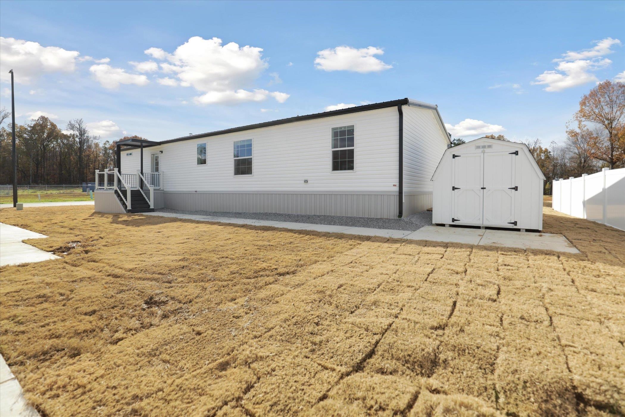 4046 Hinge Gate Lane Memphis, TN 38128 - Photo 24 of 24 a view of a house with backyard
