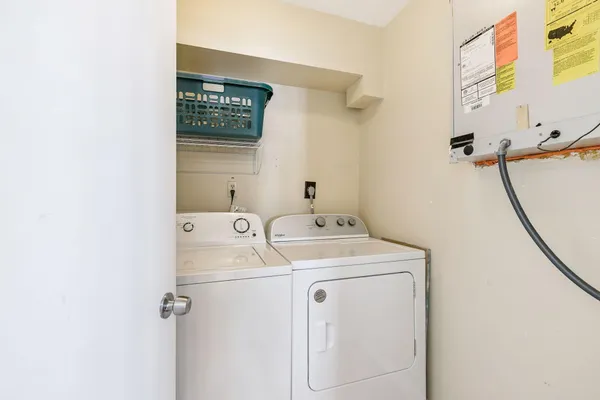 a bathroom with a sink toilet mirror and shower