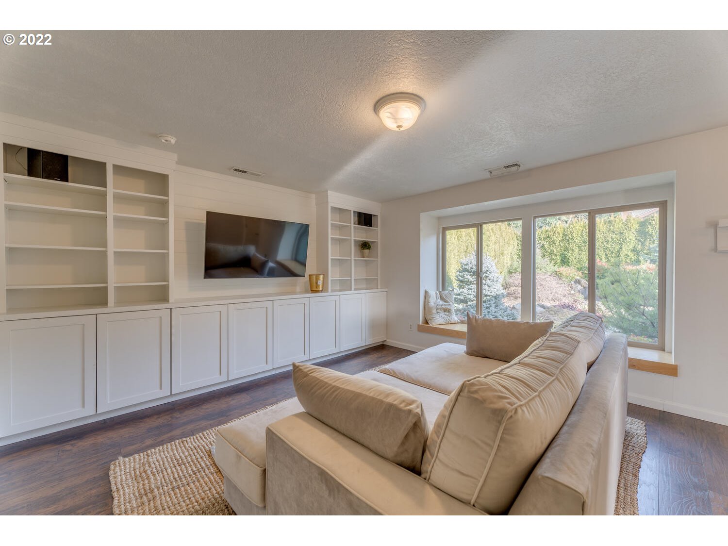 211 South 5th Avenue Ridgefield, WA 98642 - Photo 3 of 16 a living room with furniture and a flat screen tv