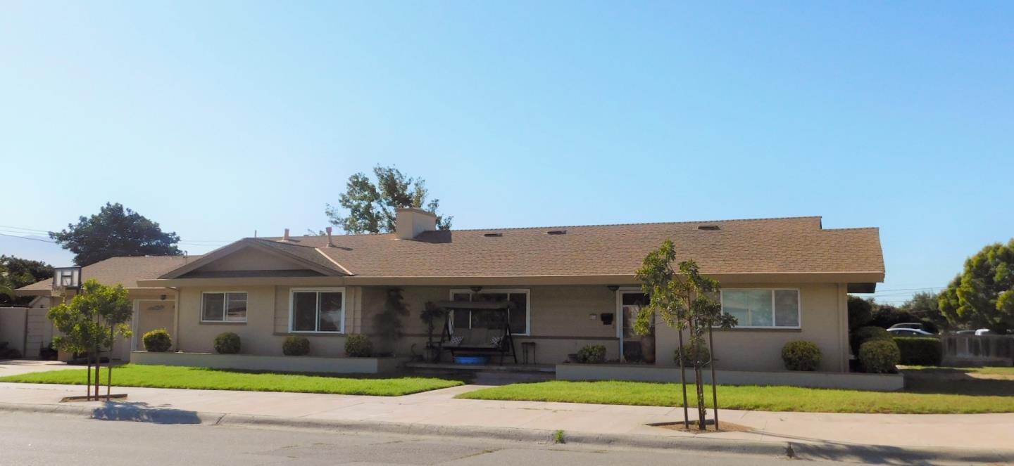 461 Soledad Street Soledad, CA 93960 - Photo 21 of 21 a front view of a house with a yard and palm tree