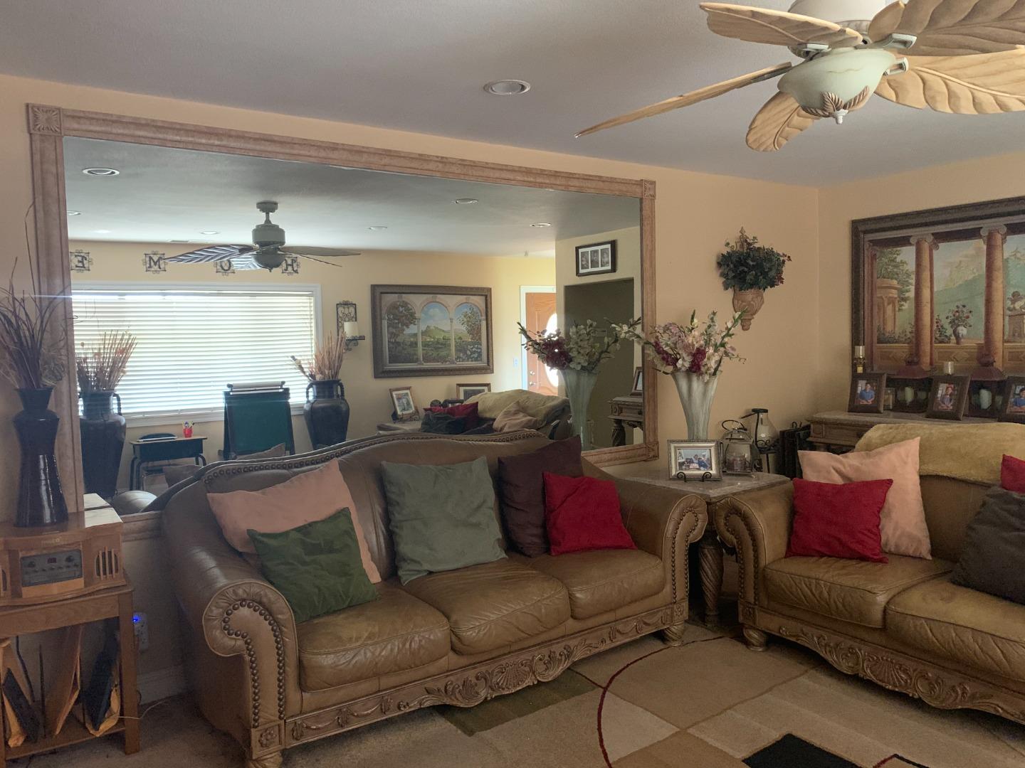 461 Soledad Street Soledad, CA 93960 - Photo 5 of 21 a living room with furniture and a fireplace