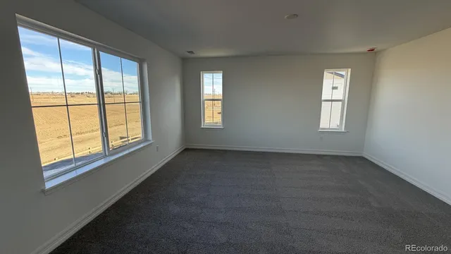 a view of a closet area with living room
