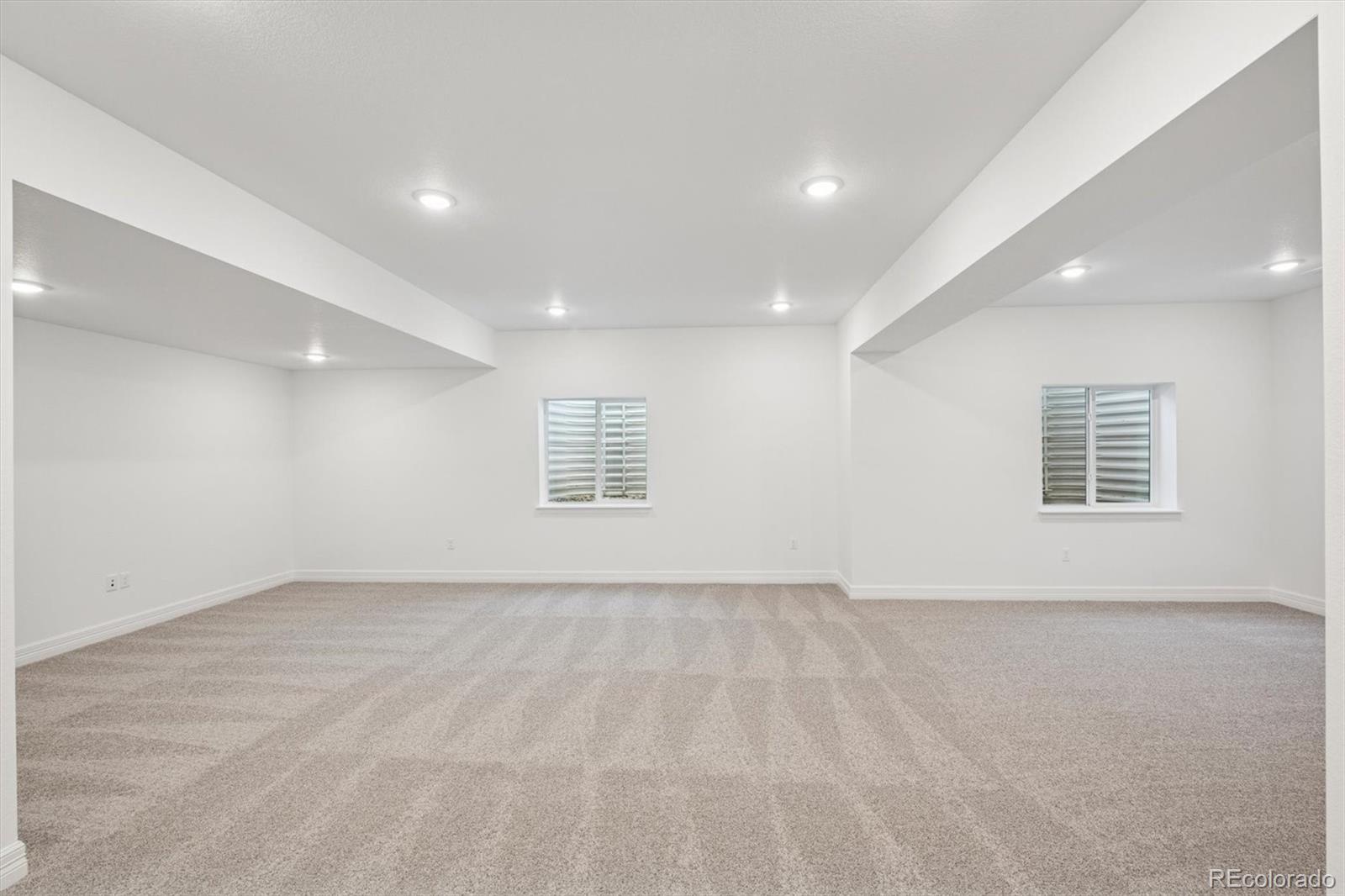 6120 Oban Road Timnath, CO 80547 - Photo 17 of 22 an empty room with windows