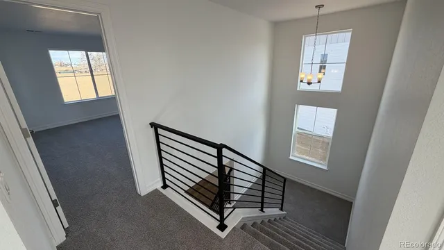 a view of swimming pool from a balcony