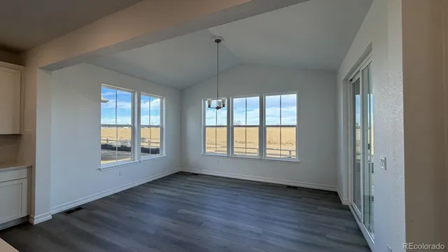 a spacious bathroom with a tub sink shower and mirror