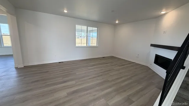 an empty room with windows