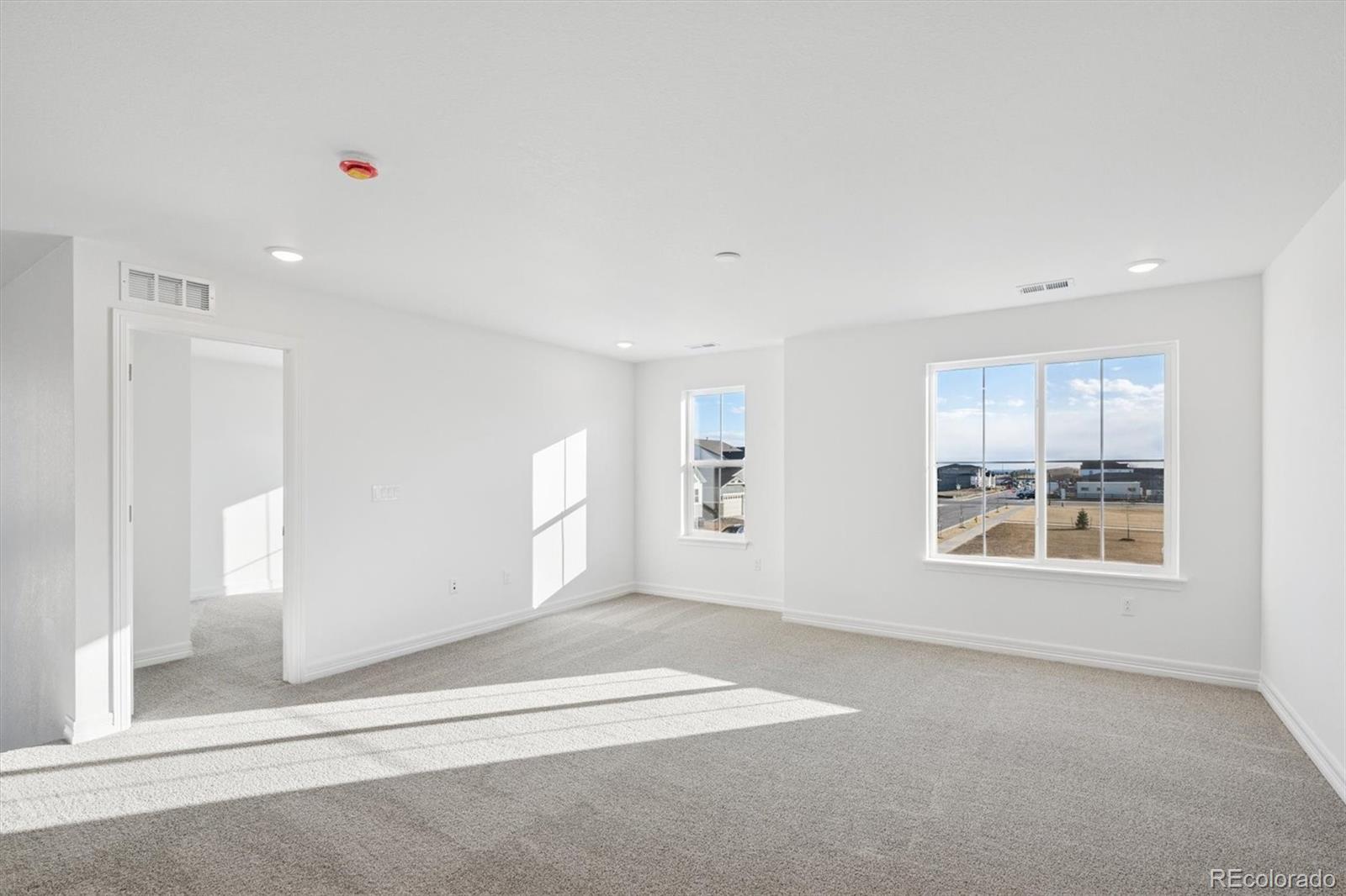 6120 Oban Road Timnath, CO 80547 - Photo 8 of 22 a view of an empty room with a window