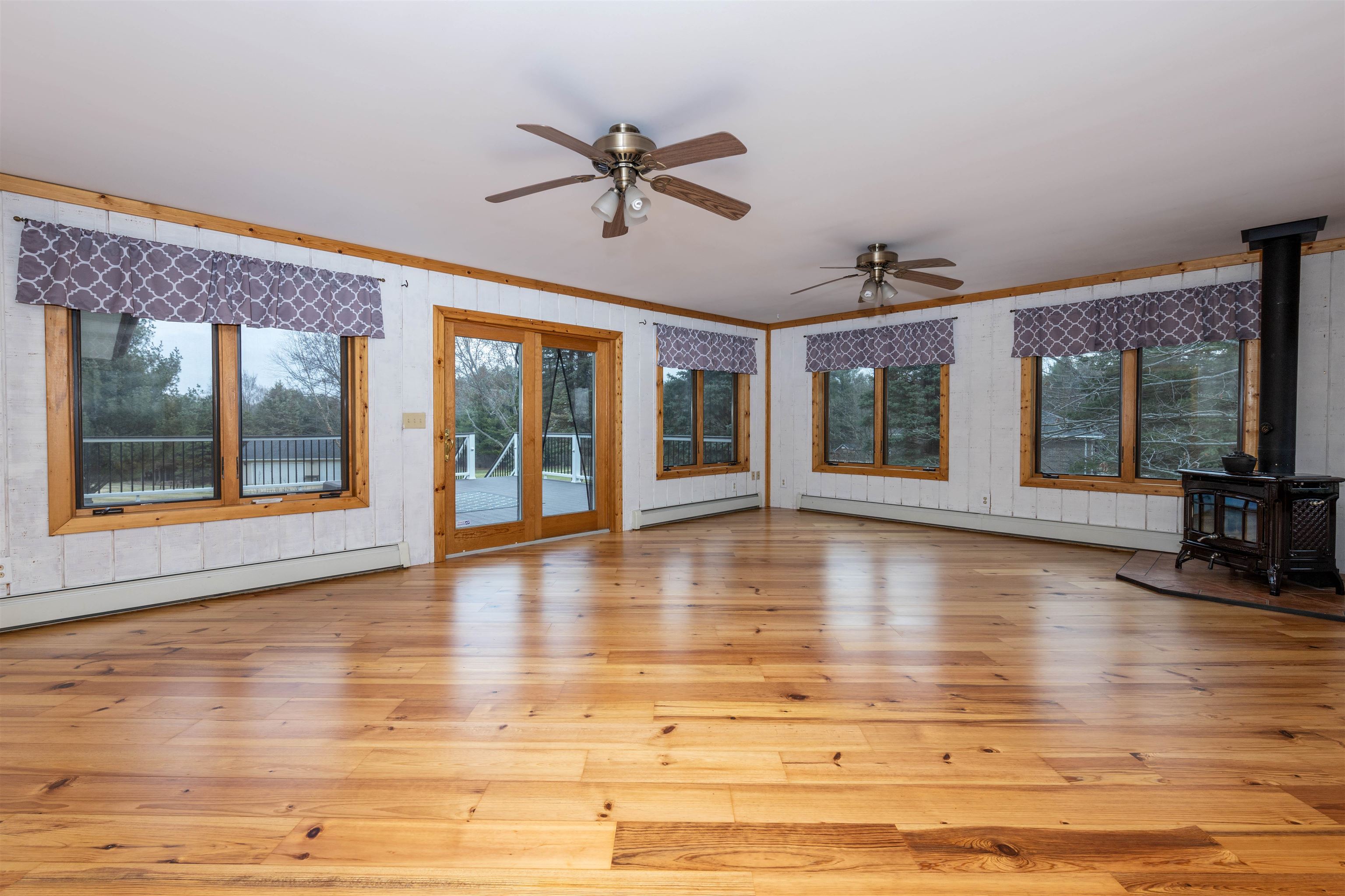 5178 Shattuck Road Belvidere, IL 61008 - Photo 13 of 46 a view of an empty room with wooden floor and a window