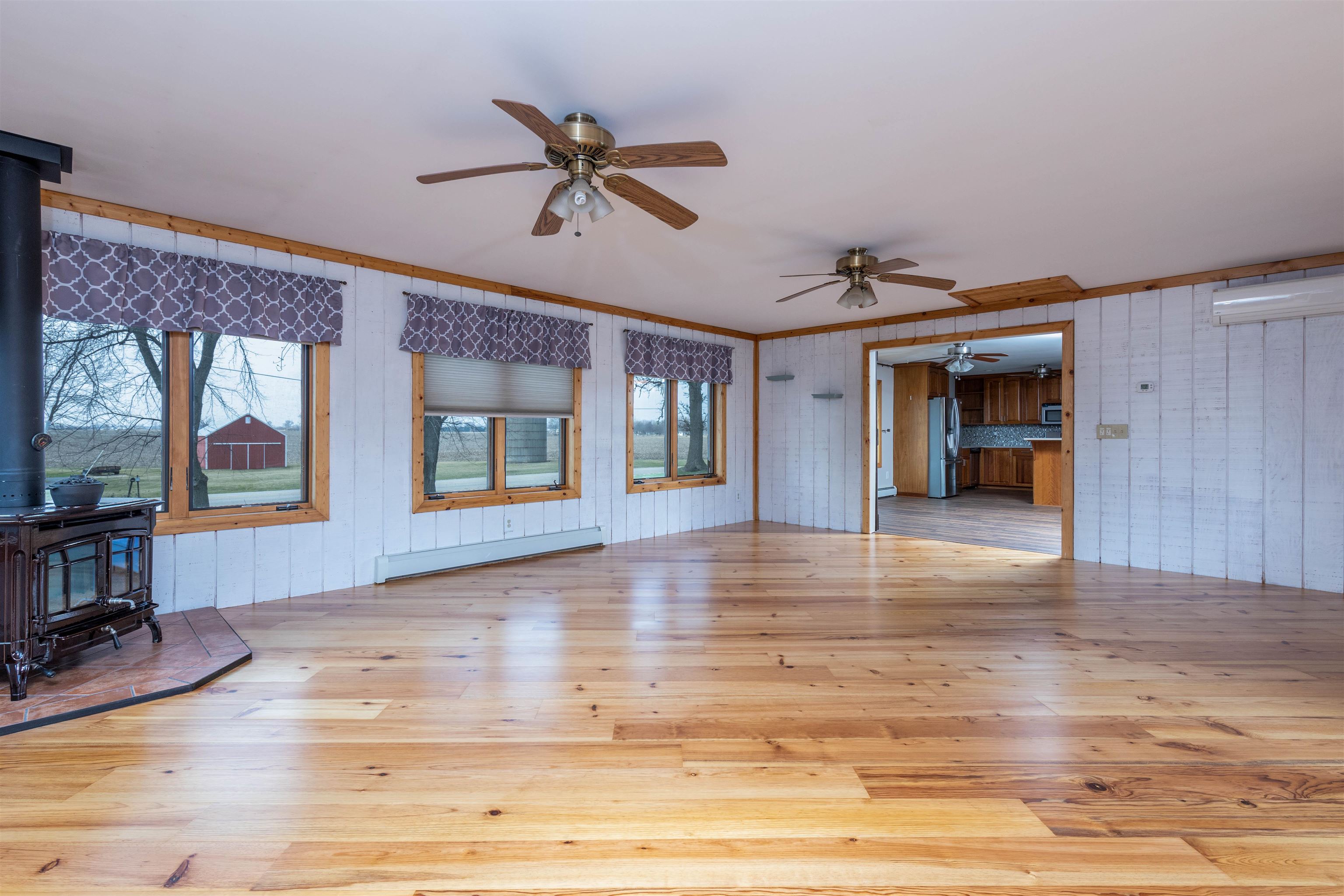 5178 Shattuck Road Belvidere, IL 61008 - Photo 14 of 46 a view of an empty room with window and wooden floor