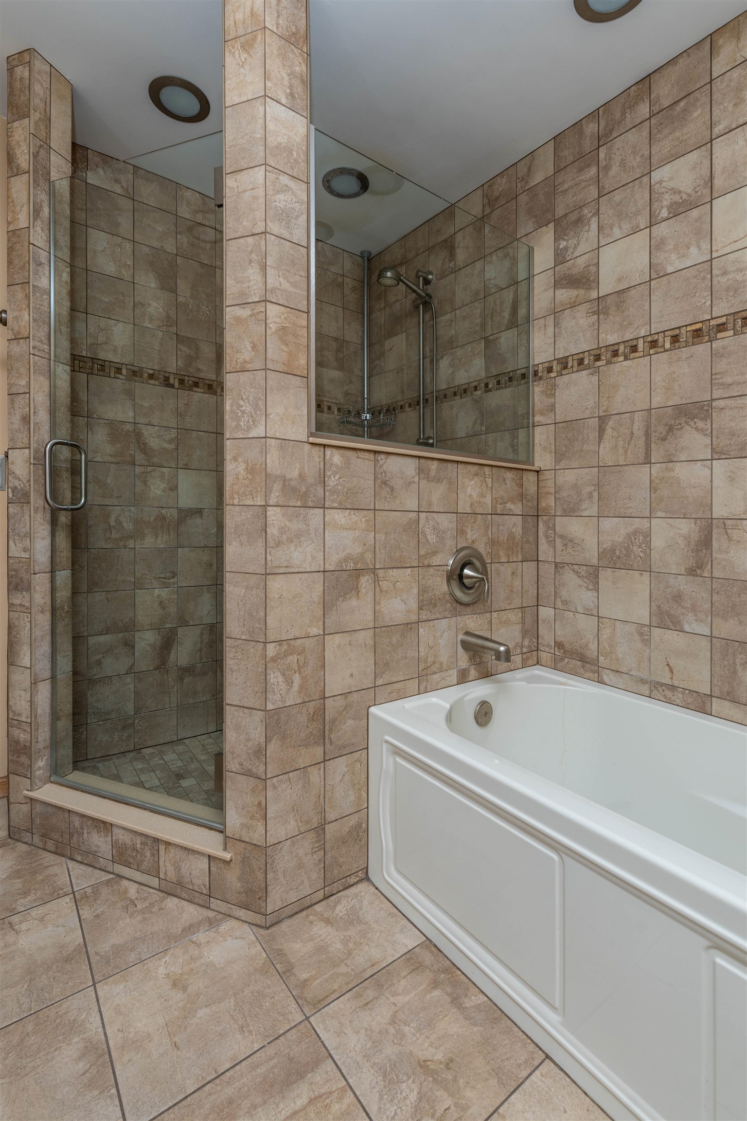 5178 Shattuck Road Belvidere, IL 61008 - Photo 19 of 46 a bathroom with a bathtub and shower