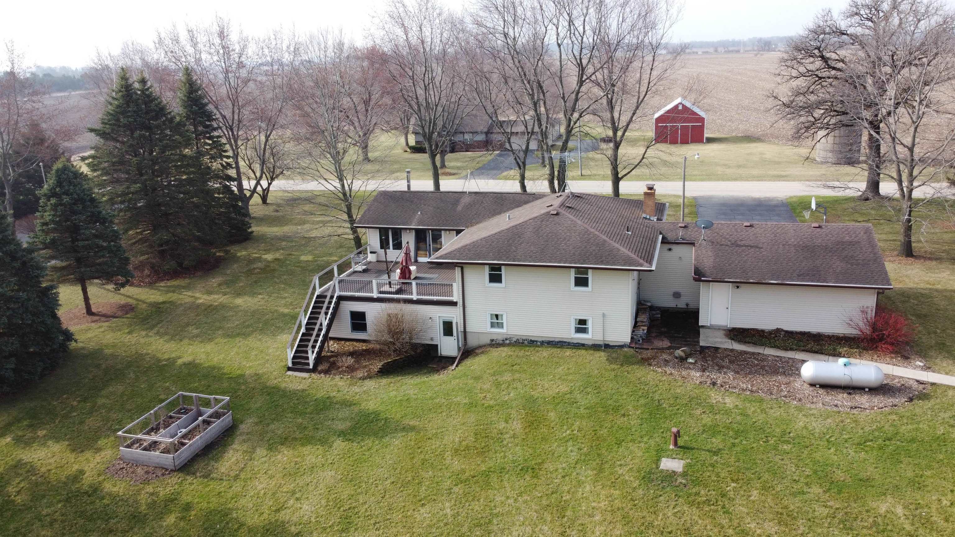 5178 Shattuck Road Belvidere, IL 61008 - Photo 45 of 46 a front view of a house with garden