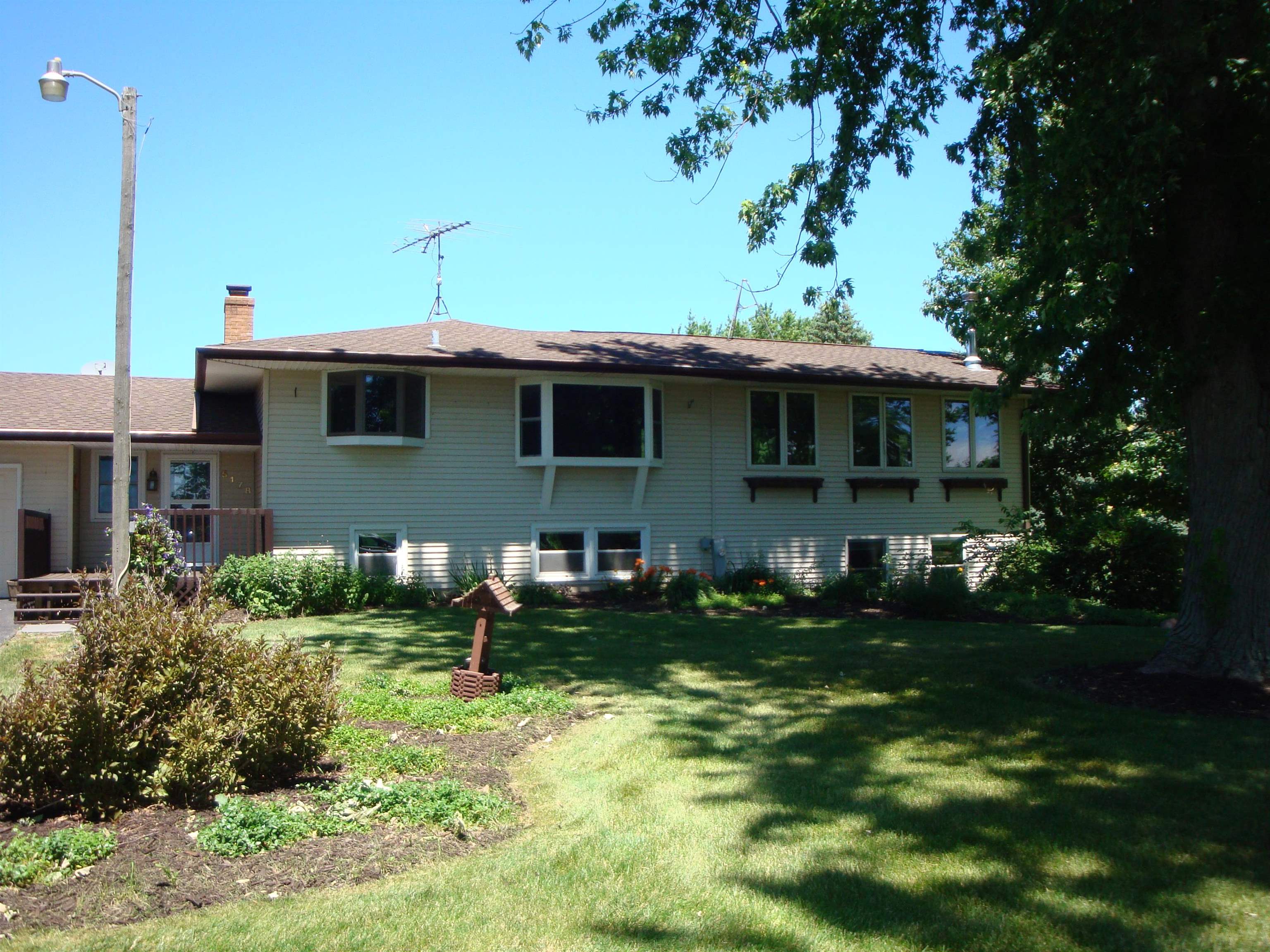 5178 Shattuck Road Belvidere, IL 61008 - Photo 46 of 46 a front view of a house with a yard