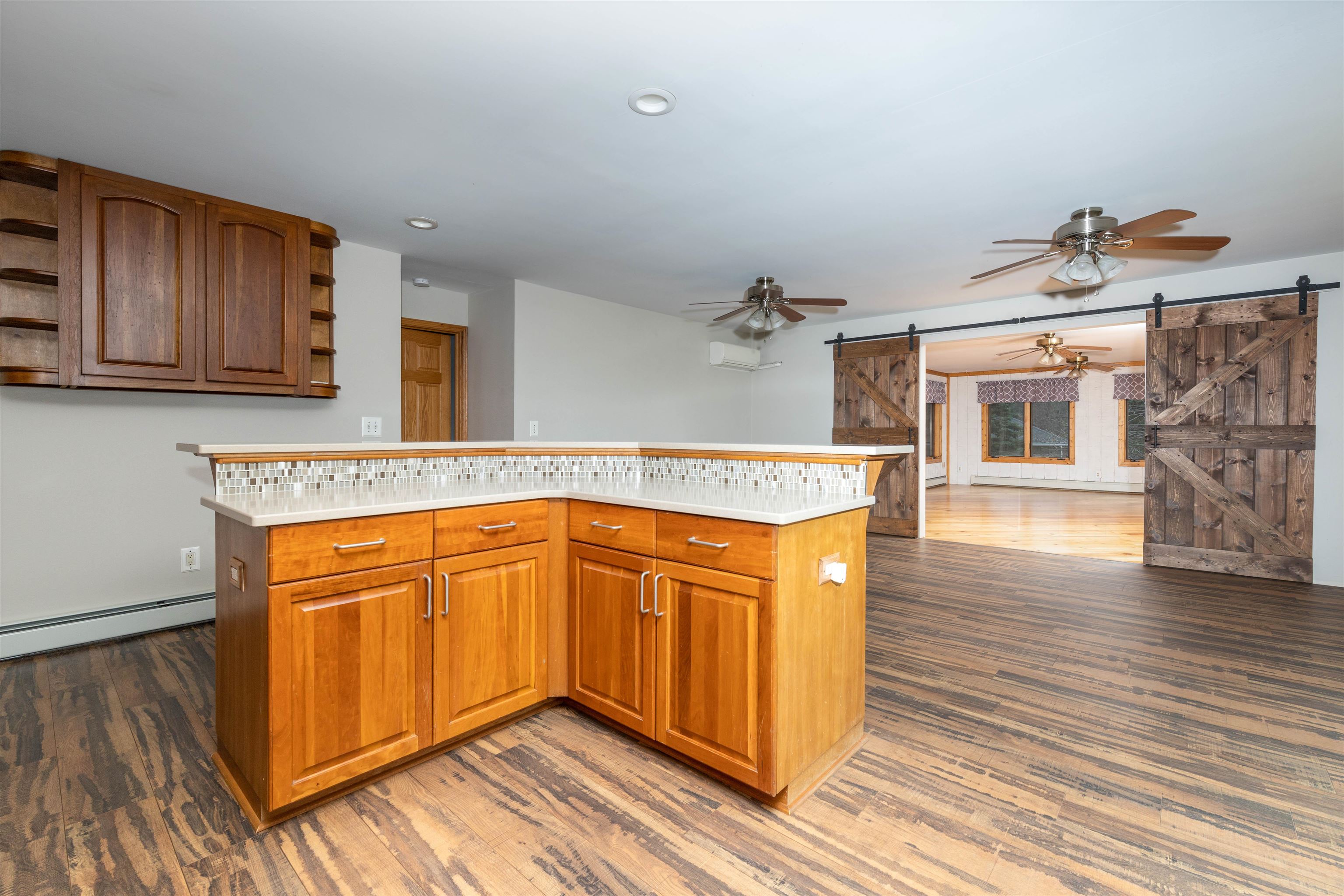 5178 Shattuck Road Belvidere, IL 61008 - Photo 8 of 46 a kitchen with stainless steel appliances granite countertop wooden cabinets and a wooden floor
