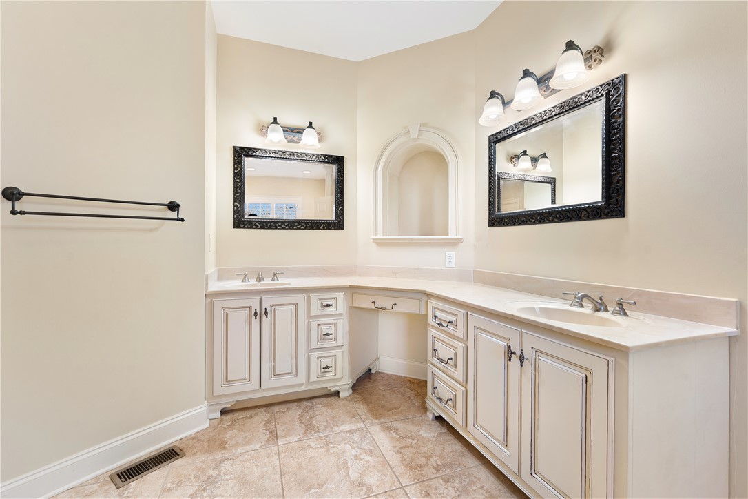 109 Limelight Drive Anderson, SC 29621 - Photo 15 of 34 This bathroom features dual vanities and classic tile flooring.