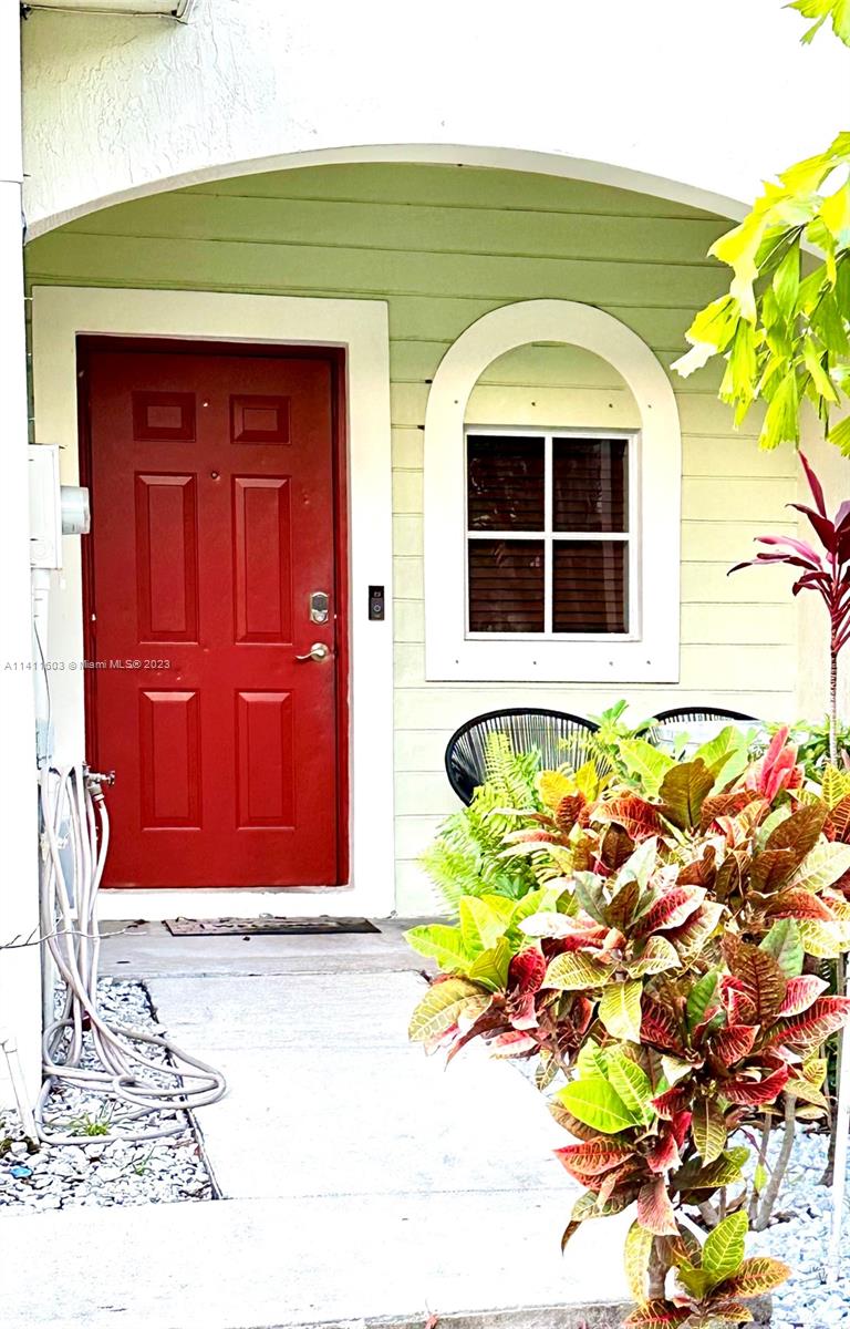 a front view of a house with a garage