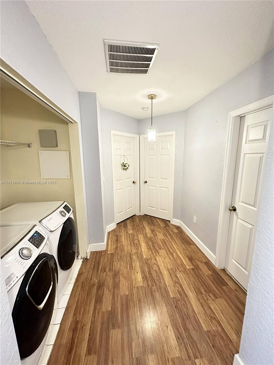 4322 Emerald Vista Lake Worth, FL 33461 - Photo 20 of 40 a view of empty room with washer and dryer