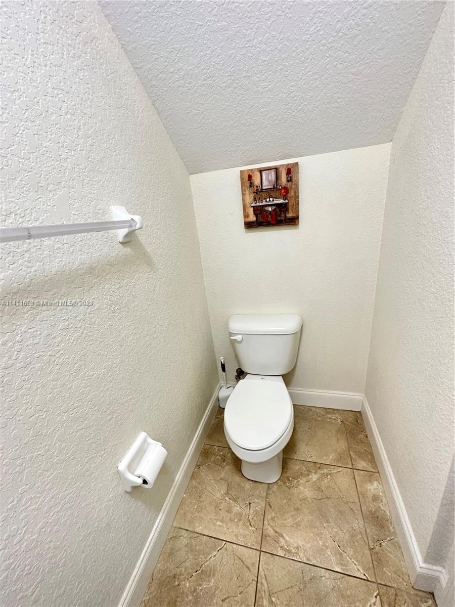4322 Emerald Vista Lake Worth, FL 33461 - Photo 31 of 40 a bathroom with a toilet