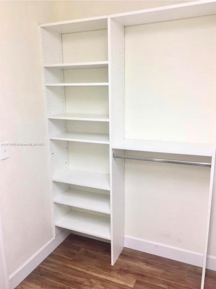 4322 Emerald Vista Lake Worth, FL 33461 - Photo 7 of 40 a view of room with wooden floor