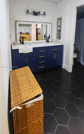 a room with furniture and wooden floor