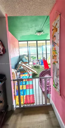 a bedroom with bed and a window