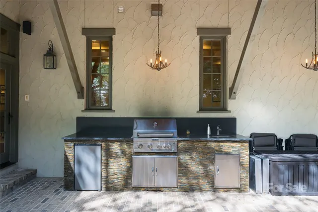 a front view of house with a garden