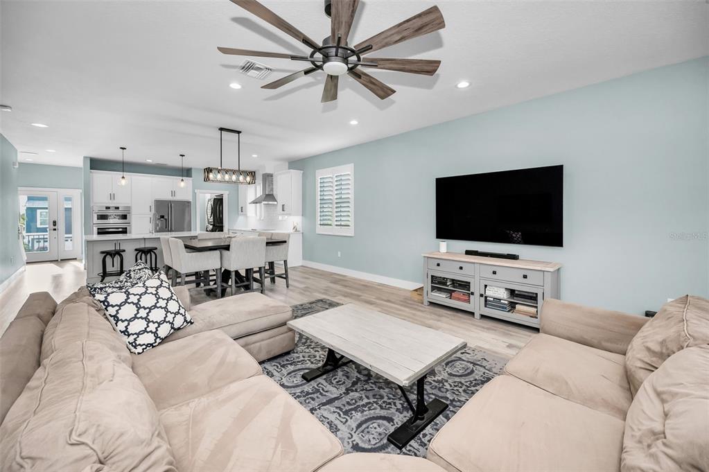 5650 Egrets Place New Port Richey, FL 34652 - Photo 15 of 73 a living room with furniture and a flat screen tv