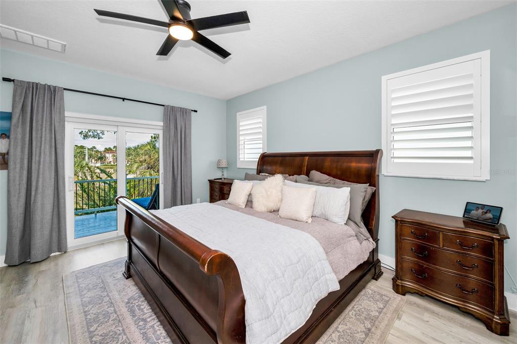 5650 Egrets Place New Port Richey, FL 34652 - Photo 31 of 73 a bed room with a bed and a window