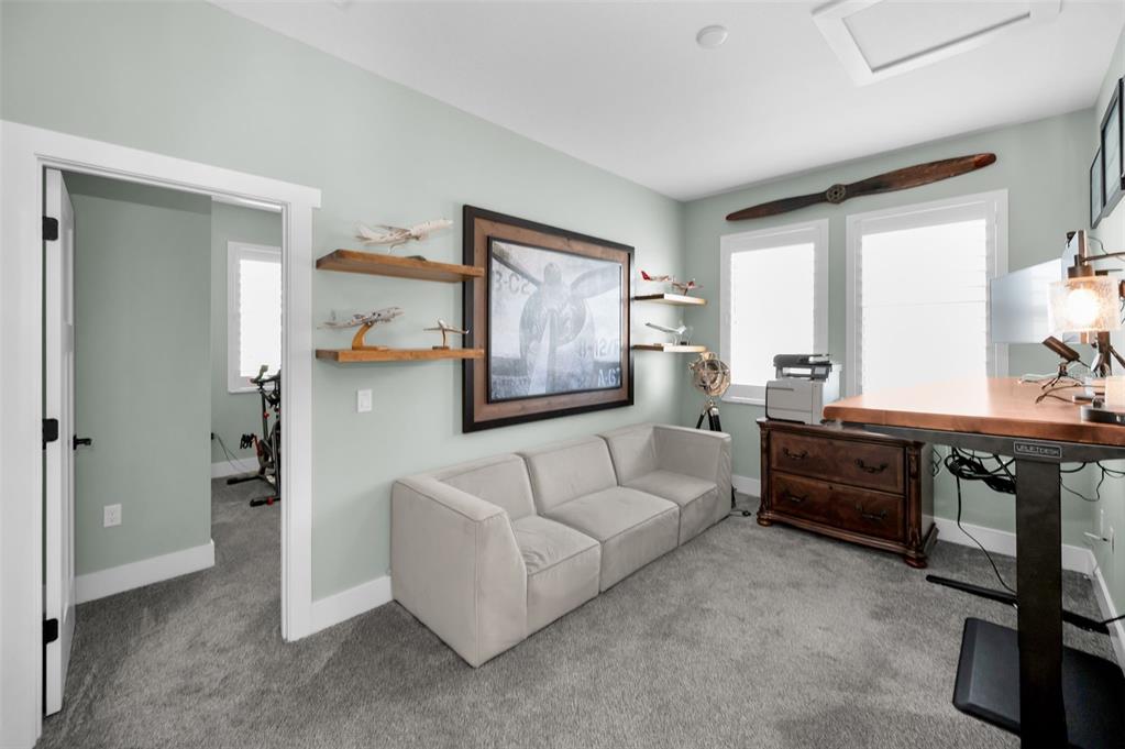 5650 Egrets Place New Port Richey, FL 34652 - Photo 45 of 73 a living room with furniture and a wooden floor