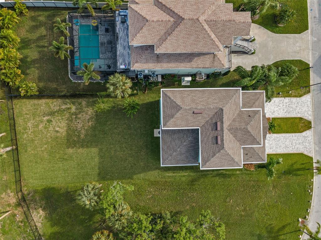 5650 Egrets Place New Port Richey, FL 34652 - Photo 60 of 73 an aerial view of a house with a garden
